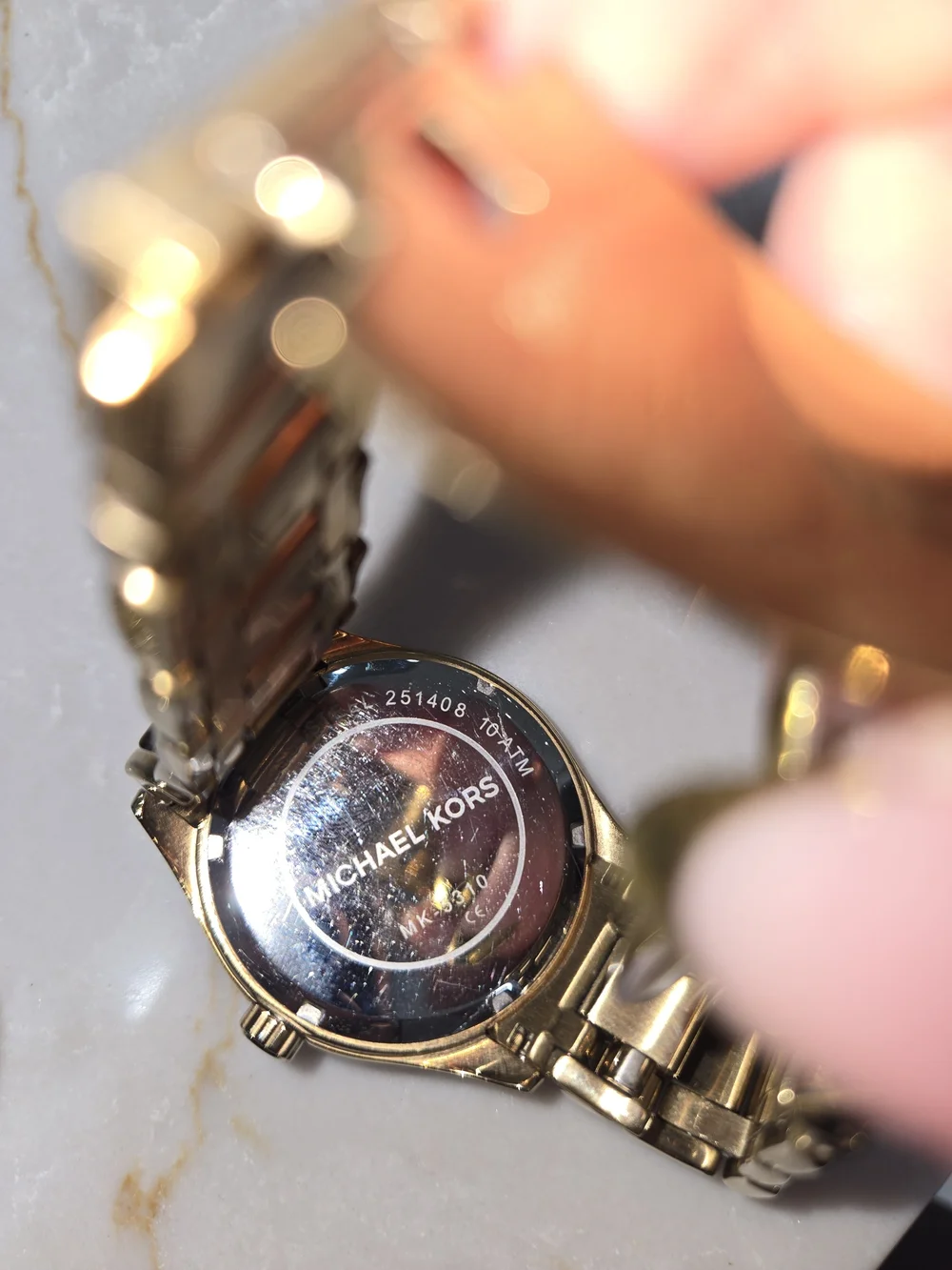 Michael Kors Women’s Gold-Tone Crystal Dial Bracelet Watch